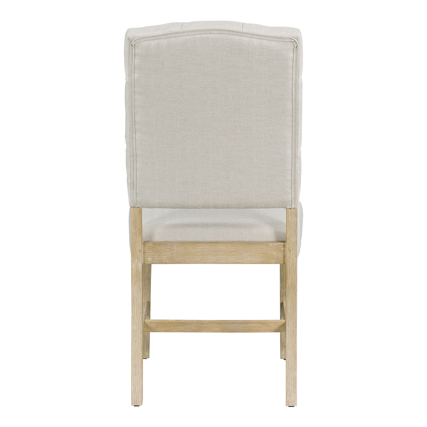 Back view of a tufted linen dining chair with a light wood frame