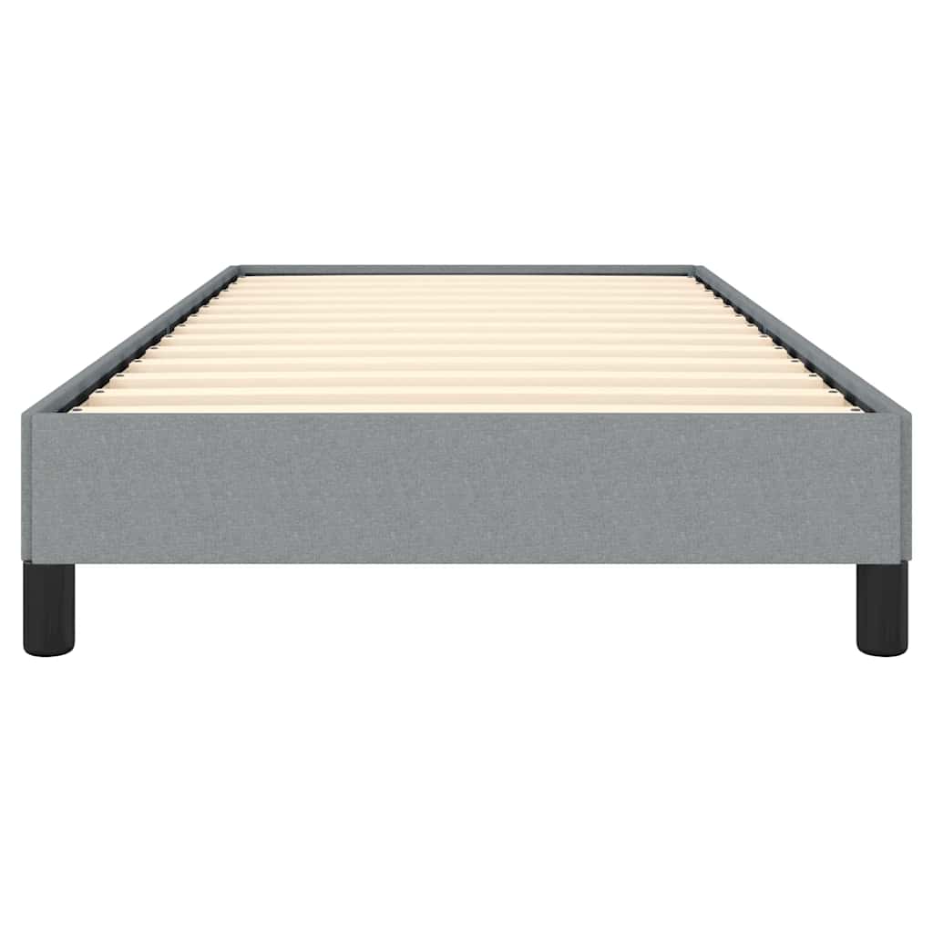 Gray upholstered bed frame with wooden slats