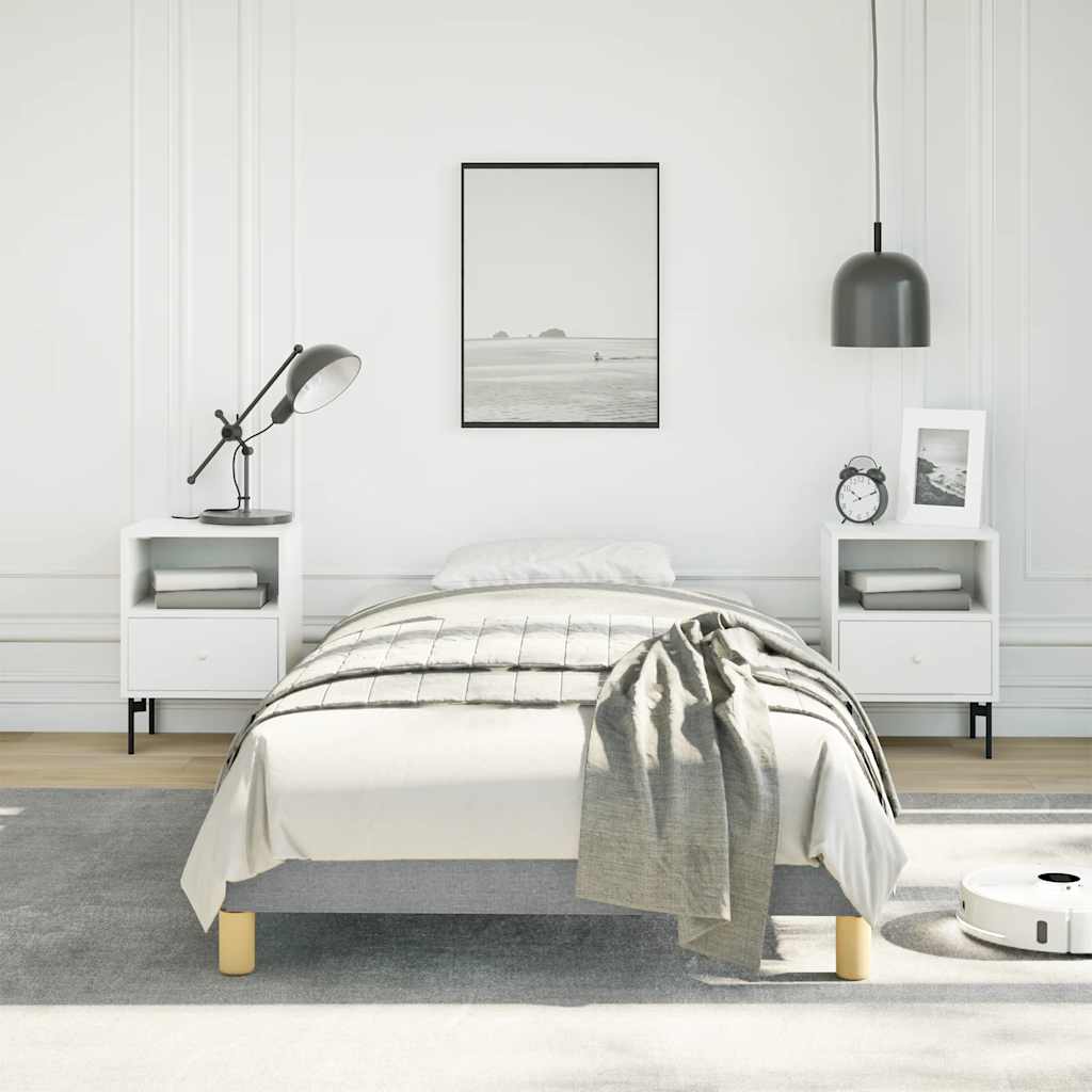 Modern upholstered twin bed with grey fabric and natural wood legs