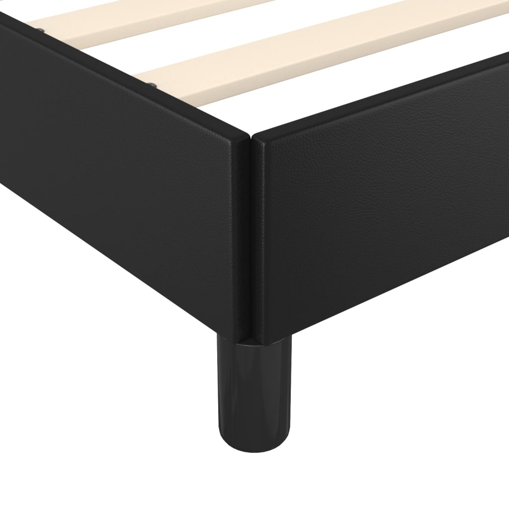 Modern black upholstered platform bed frame with slatted mattress support