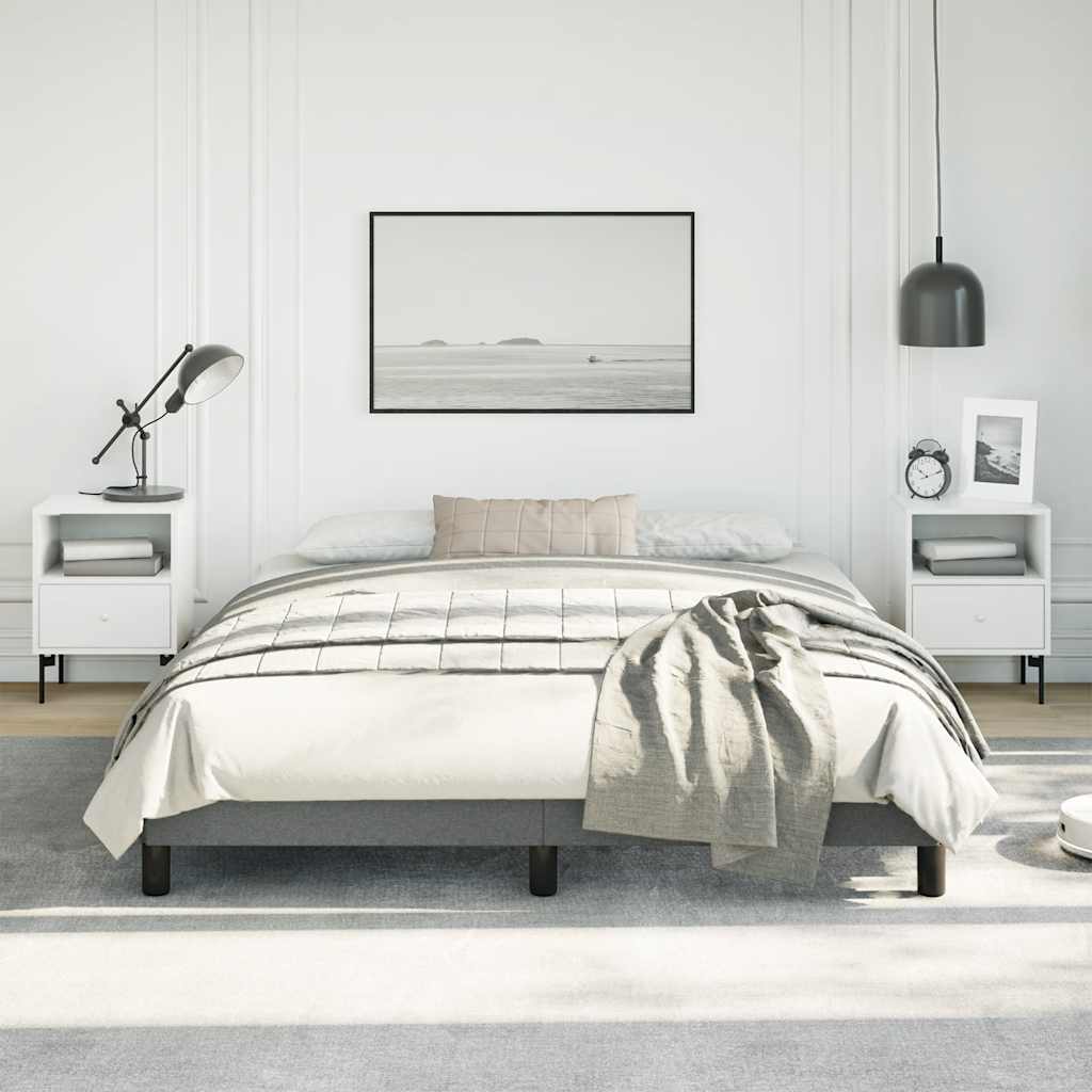 Modern grey upholstered platform bed frame with black legs