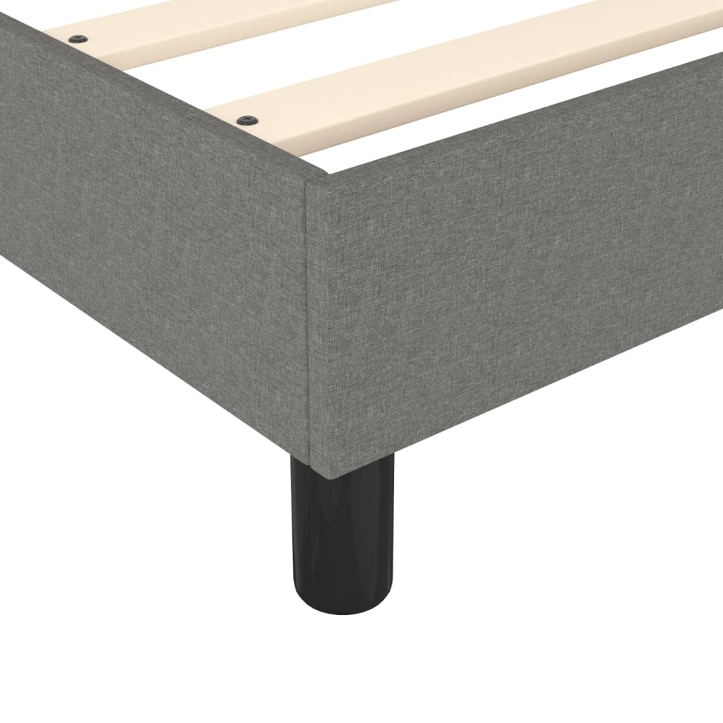 Gray upholstered bed frame with wooden slats