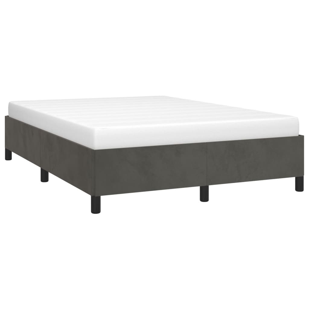 Dark gray velvet upholstered bed frame with white mattress and black legs