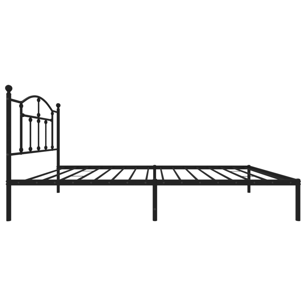 Black metal bed frame with arched headboard and white mattress