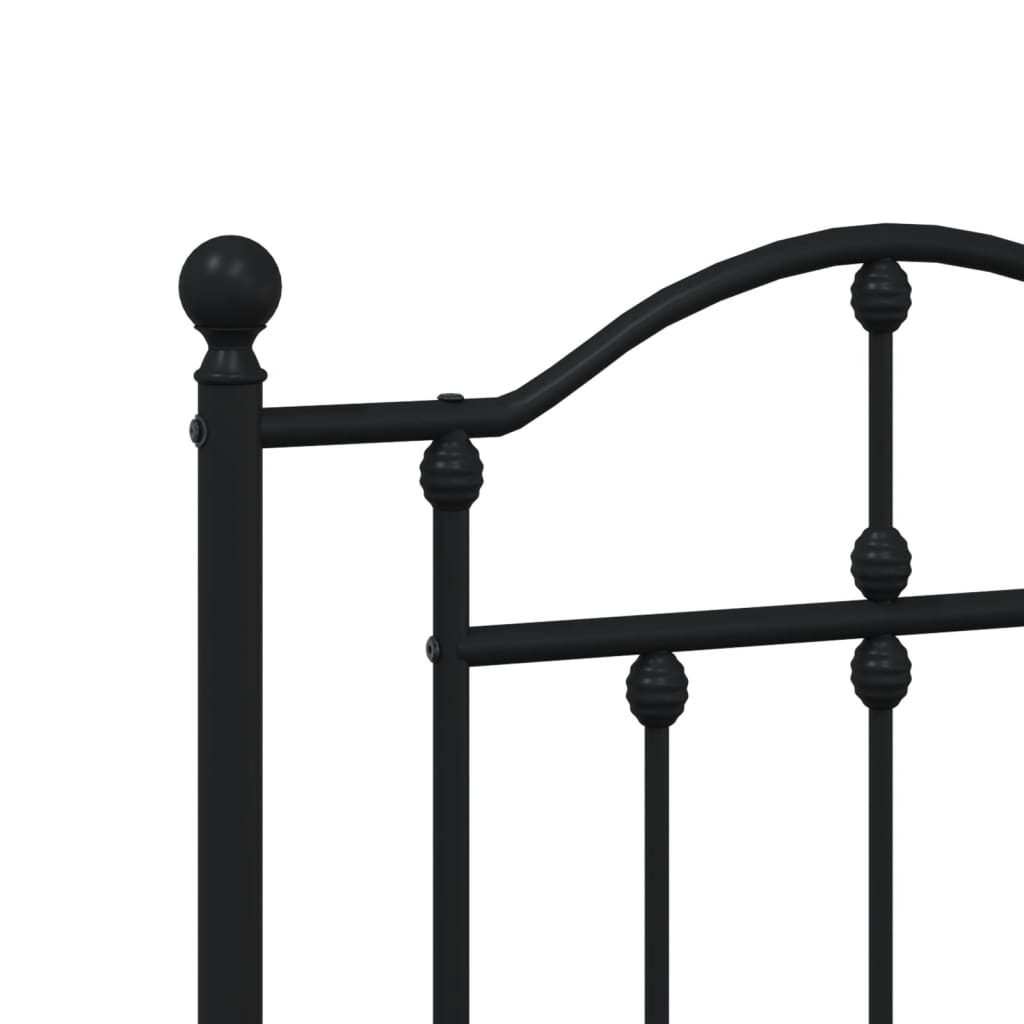 Black metal bed frame with ornate headboard and footboard