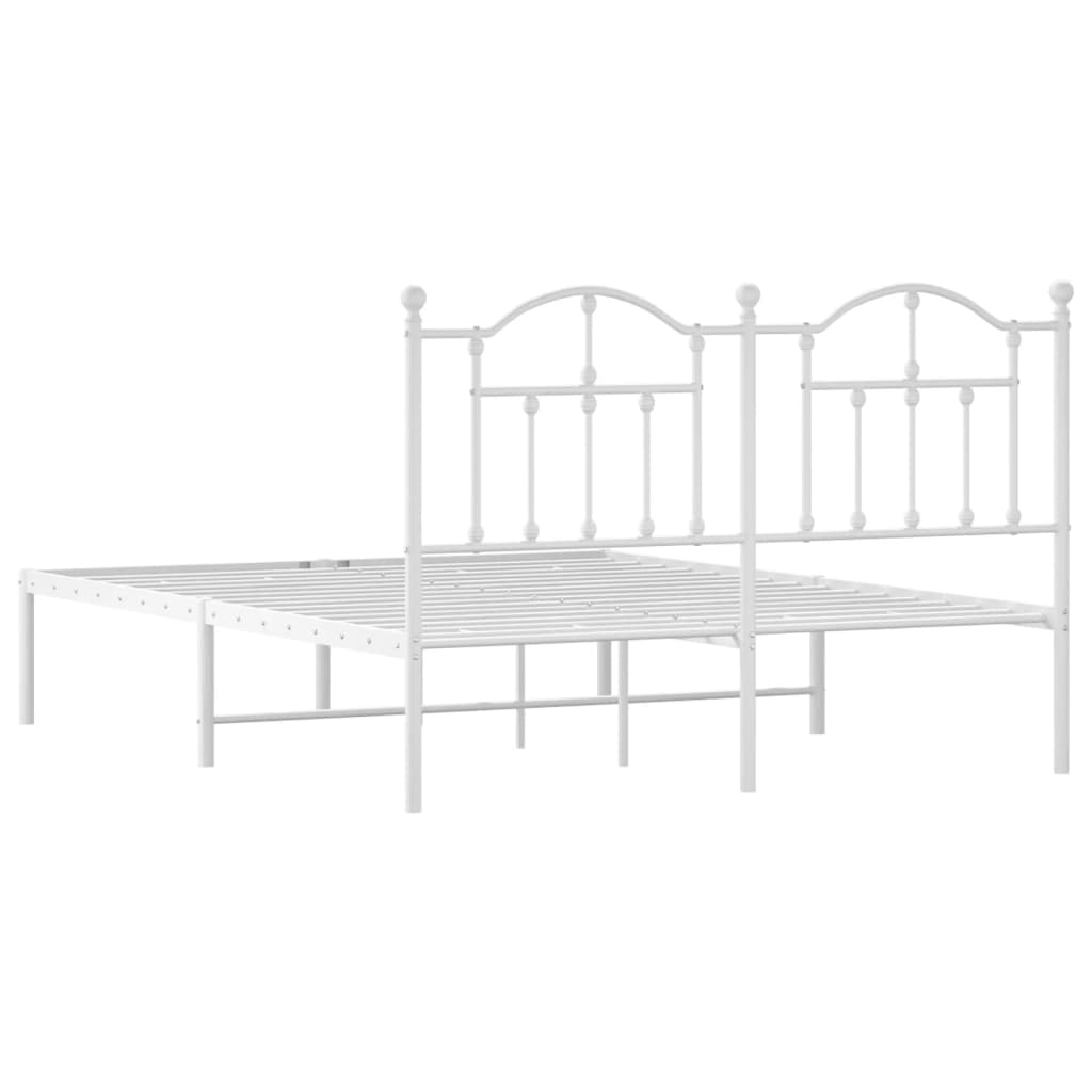 White metal twin daybed with ornate headboard and footboard