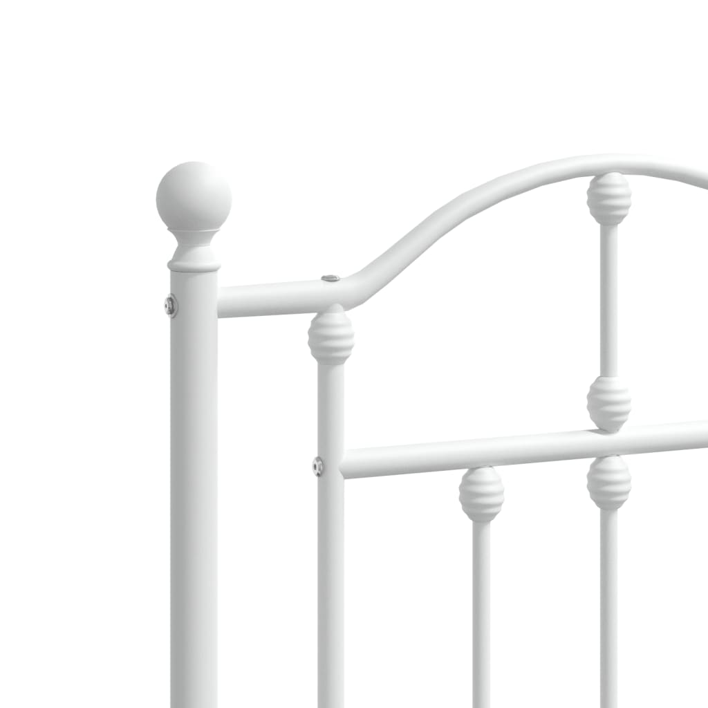 White metal bed frame with ornate headboard