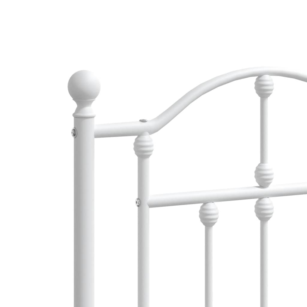 White metal bed frame with decorative finials