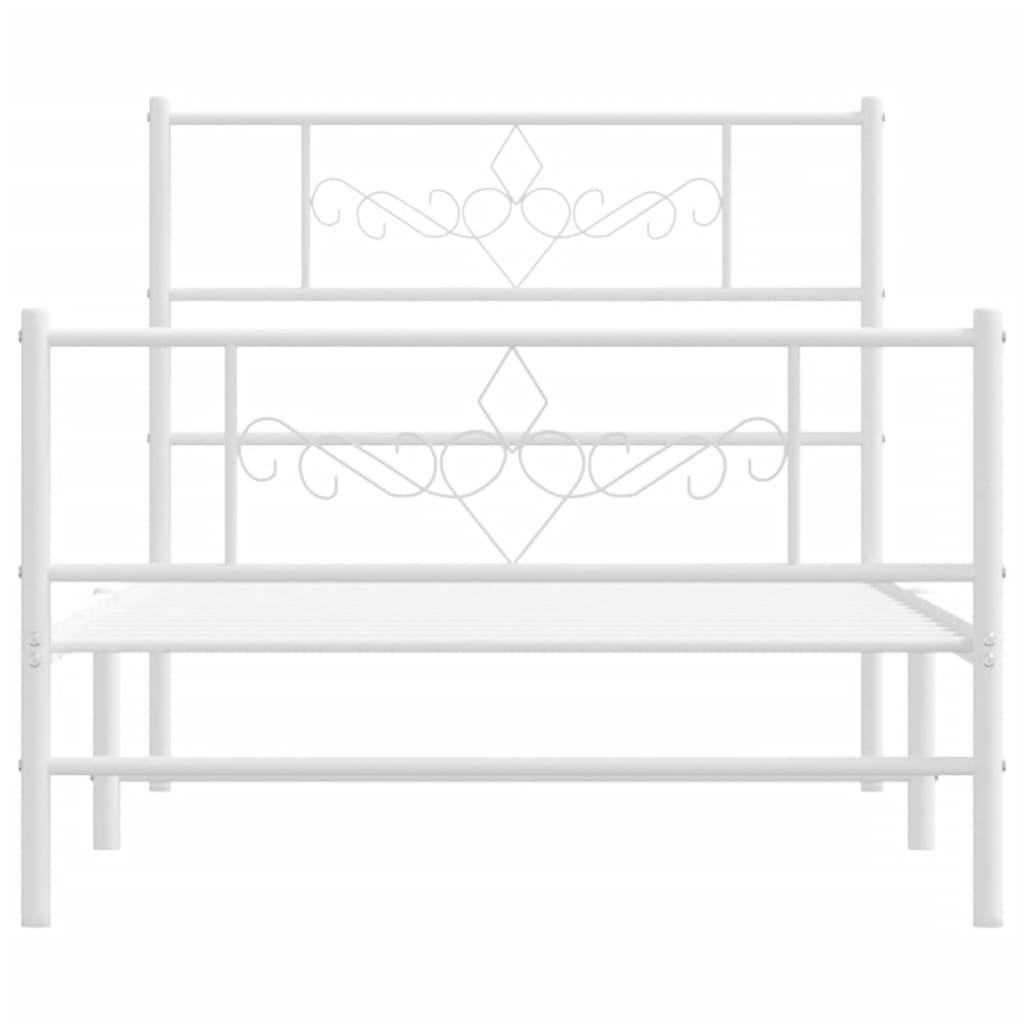 White metal bed frame with ornate headboard detail