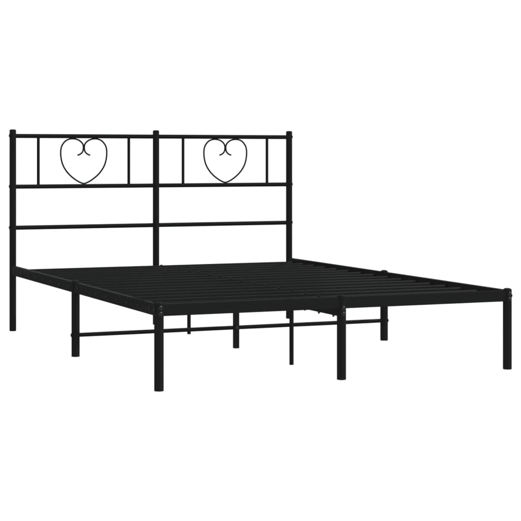 Black metal bed frame with heart detail headboard and white mattress
