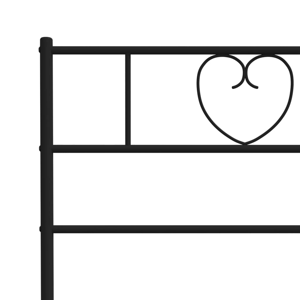 Black metal bed frame with decorative heart headboard