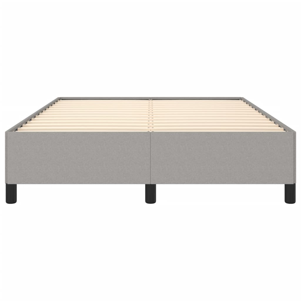 Grey fabric upholstered bed frame with white mattress