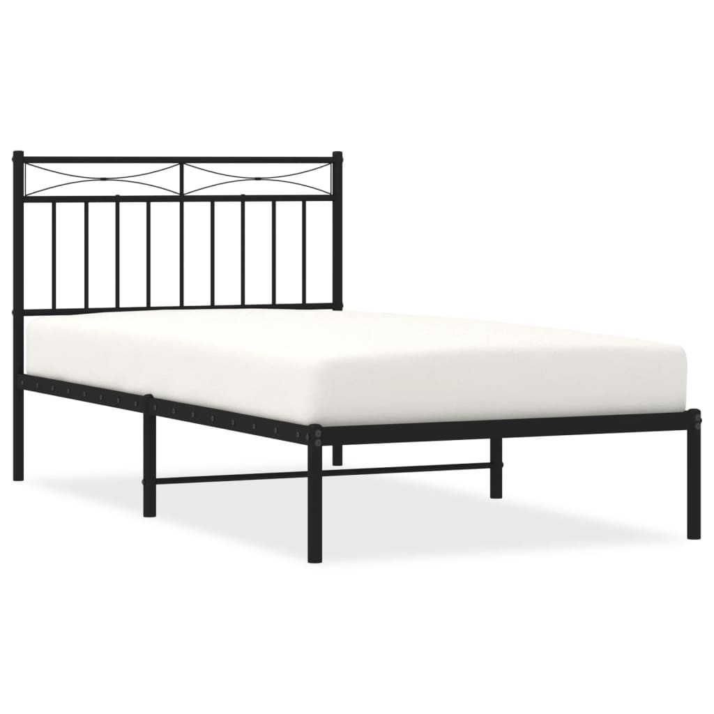 White metal bed frame with detailed headboard and slatted base