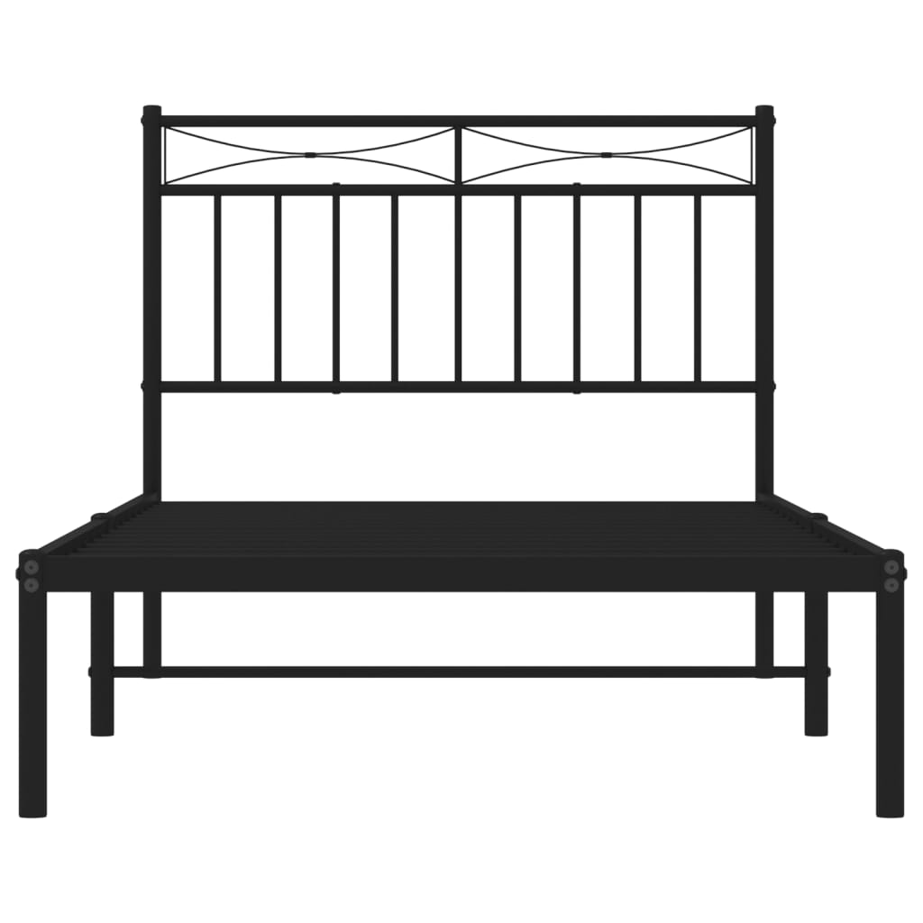 Black metal bed frame with a white mattress