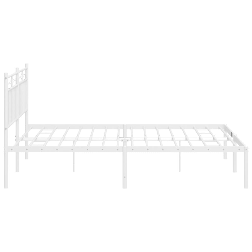 White metal bed frame with decorative headboard