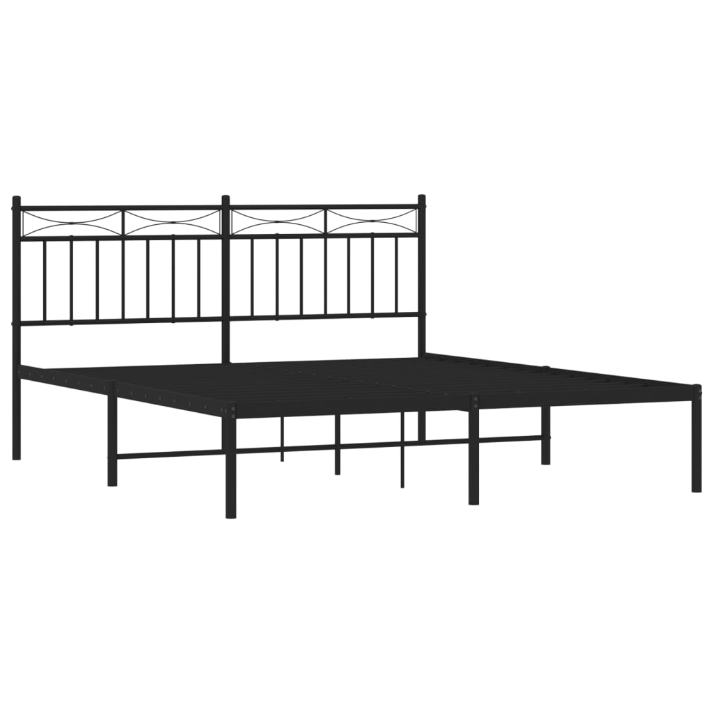 Modern black metal bed frame with decorative headboard and queen mattress