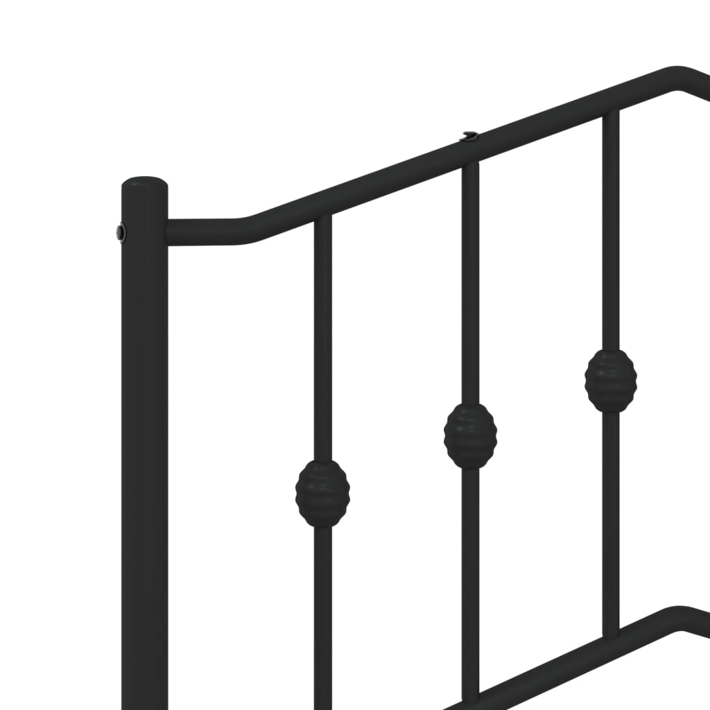 Black metal garden bench with decorative scrollwork back