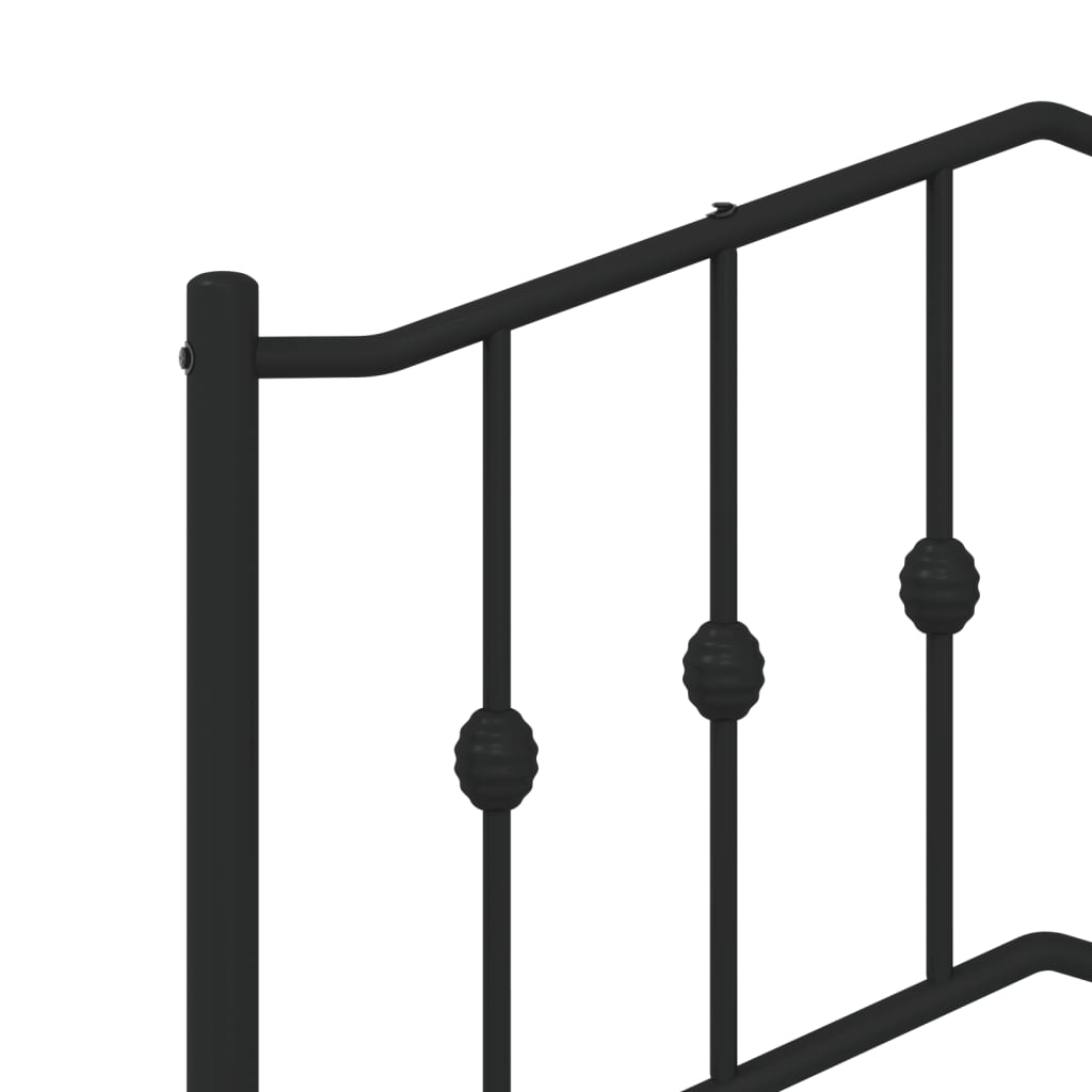 Black metal bed frame with decorative headboard and footboard
