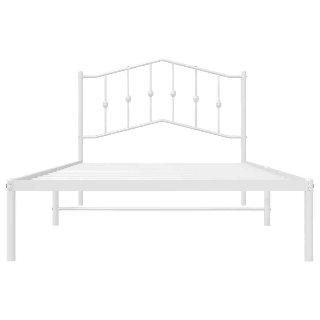 White metal twin bed frame with ornate headboard and included mattress
