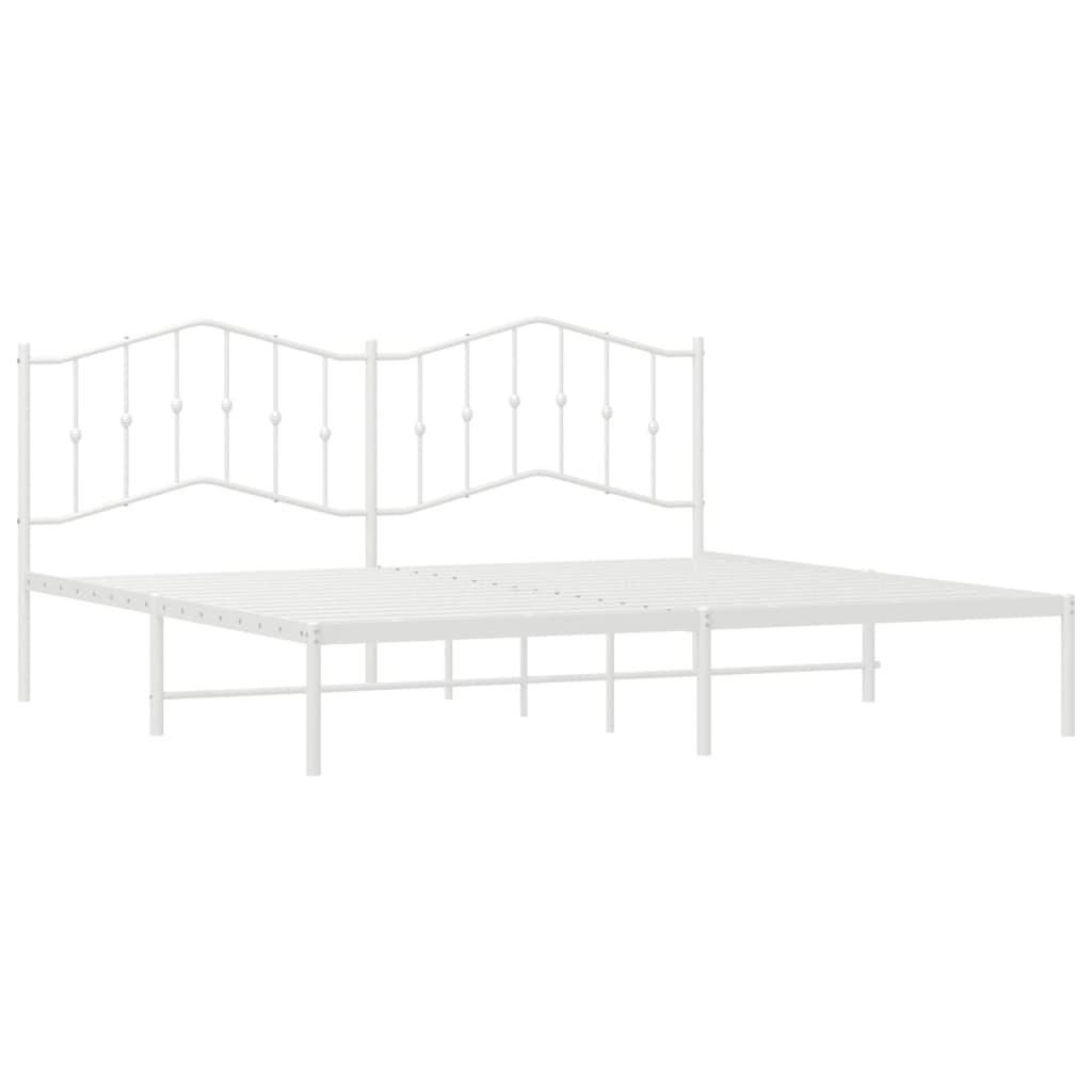 White metal twin bed frame with arched headboard and footboard