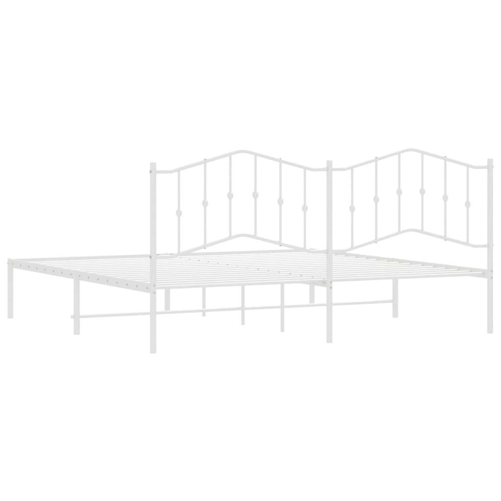 White metal twin bed frame with ornate headboard