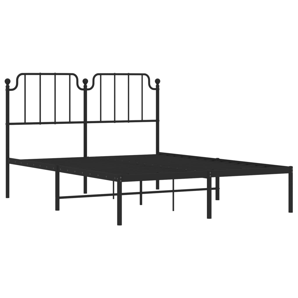 Ornate bronze metal bed frame with a decorative headboard