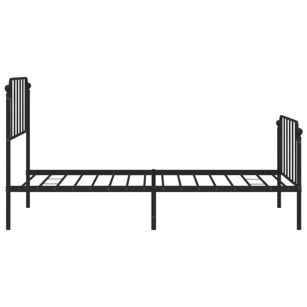 Black metal full size bed frame with ornate headboard and footboard