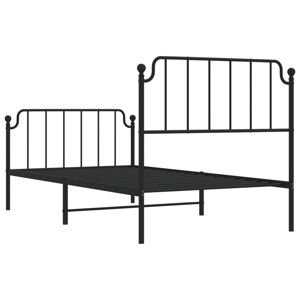 Black wrought iron metal bed frame with a slatted base and decorative finials