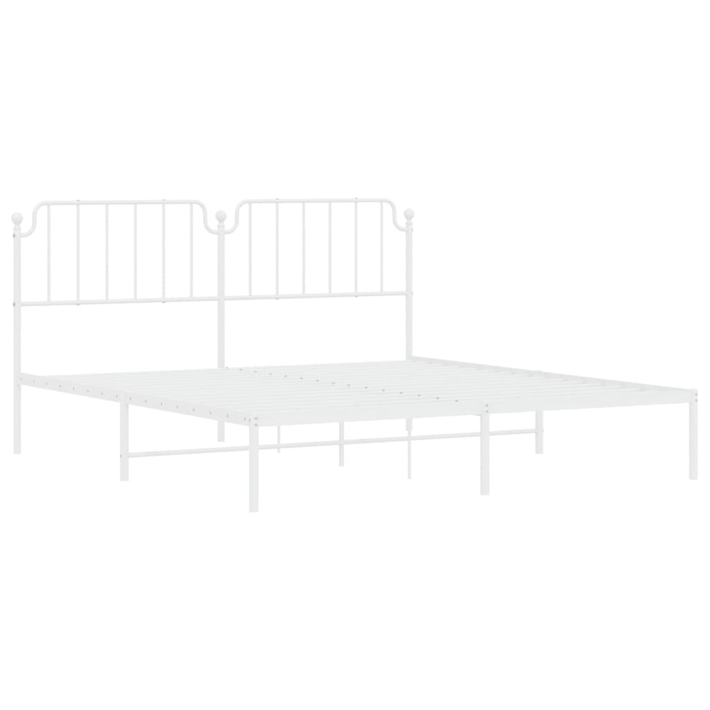 White metal bed frame with decorative headboard and footboard