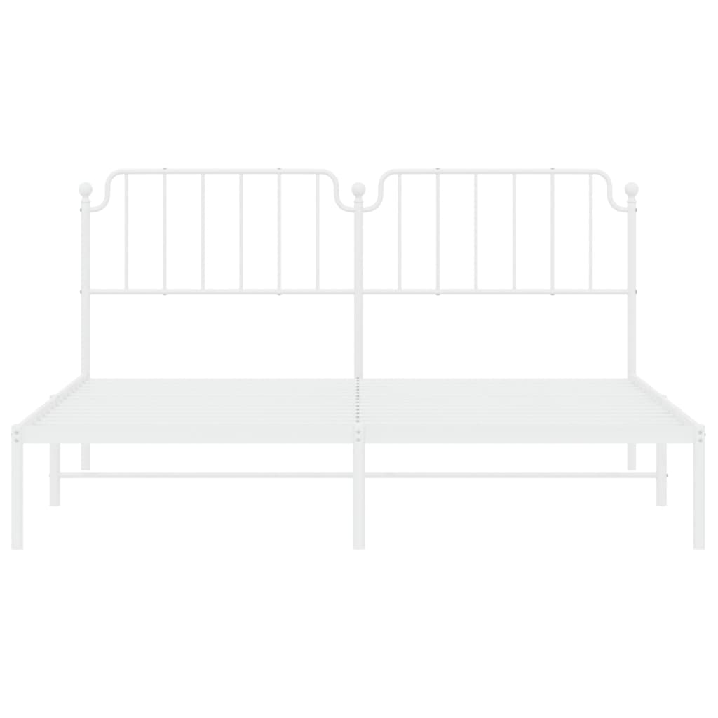 White metal bed frame with mattress