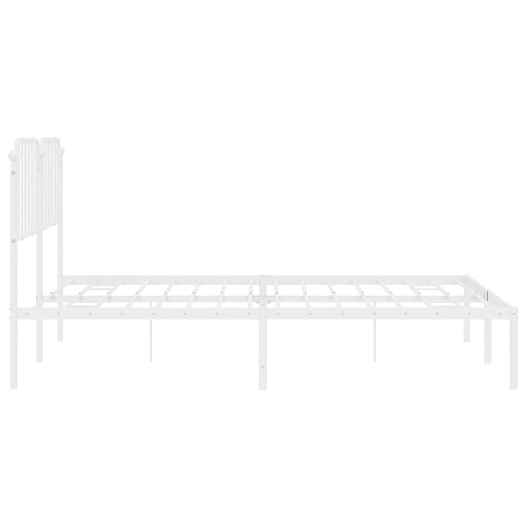 White metal bed frame with ornate headboard