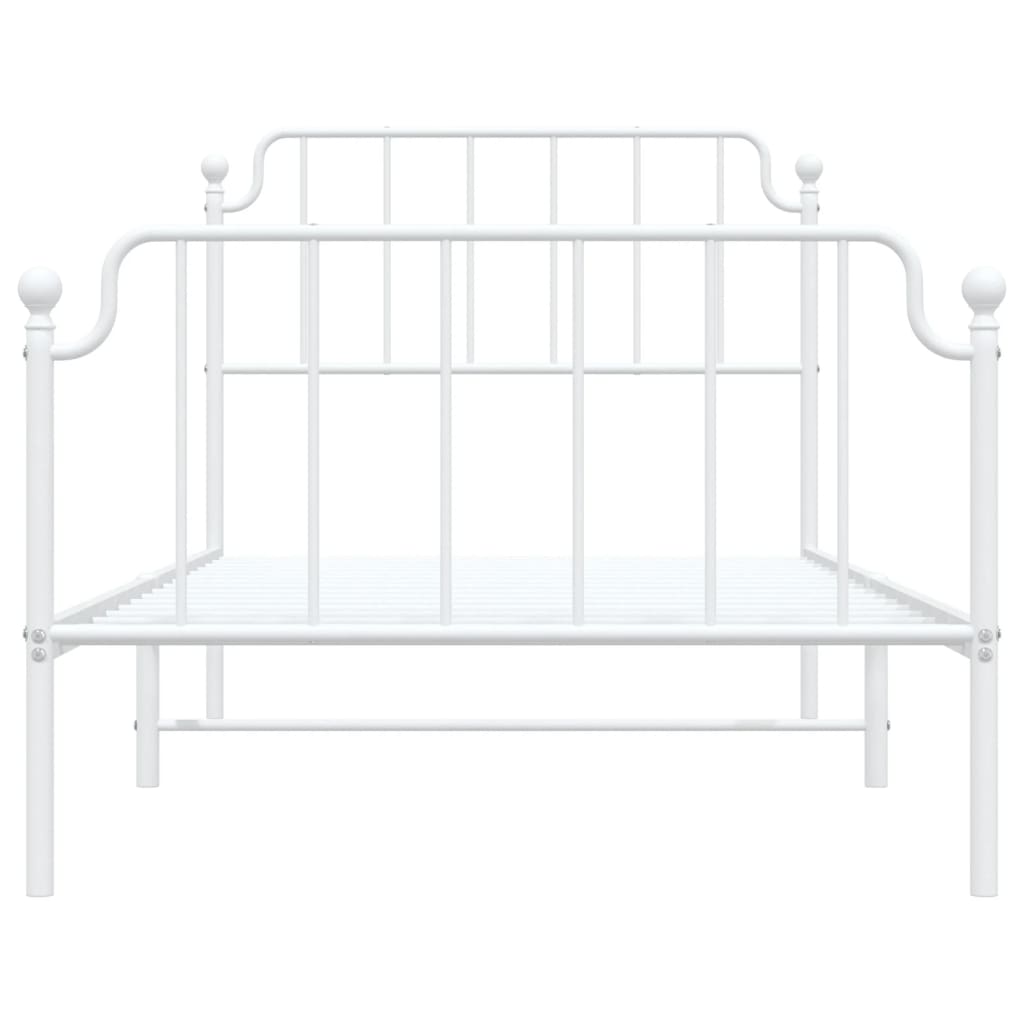 White metal twin bed frame with ornate headboard and footboard