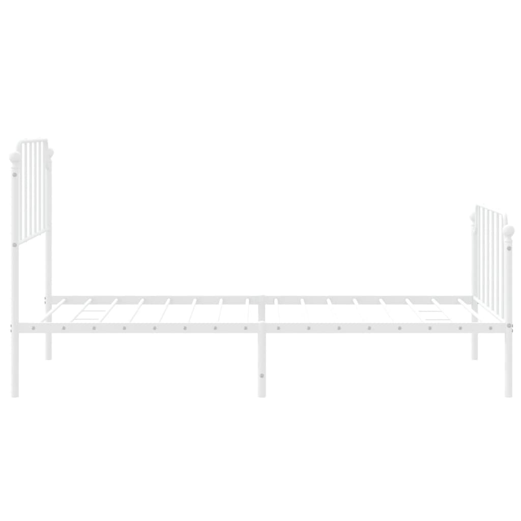 White metal twin bed frame with ornate headboard and footboard
