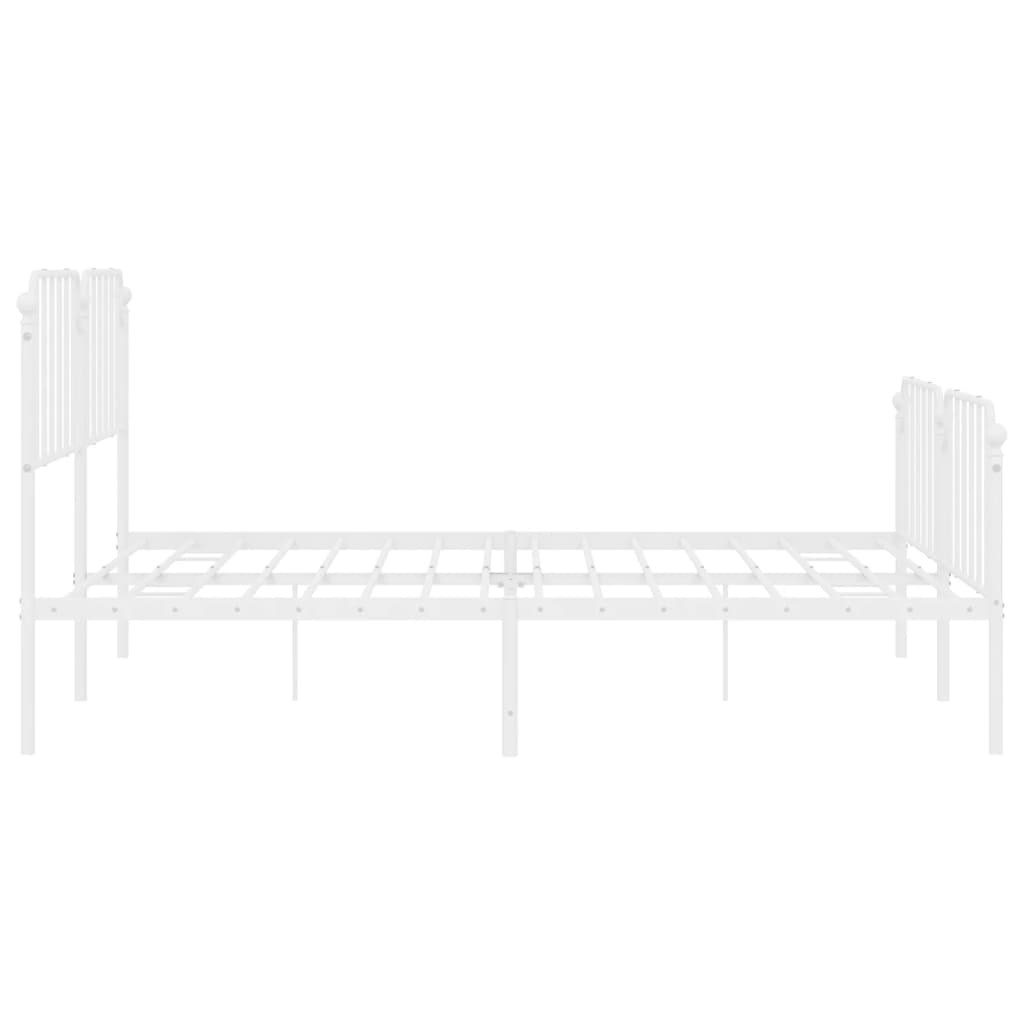 White metal bed frame with ornate scroll detailing on headboard and footboard