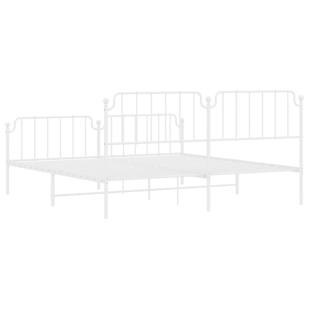White metal daybed with ornate headboard and footboard
