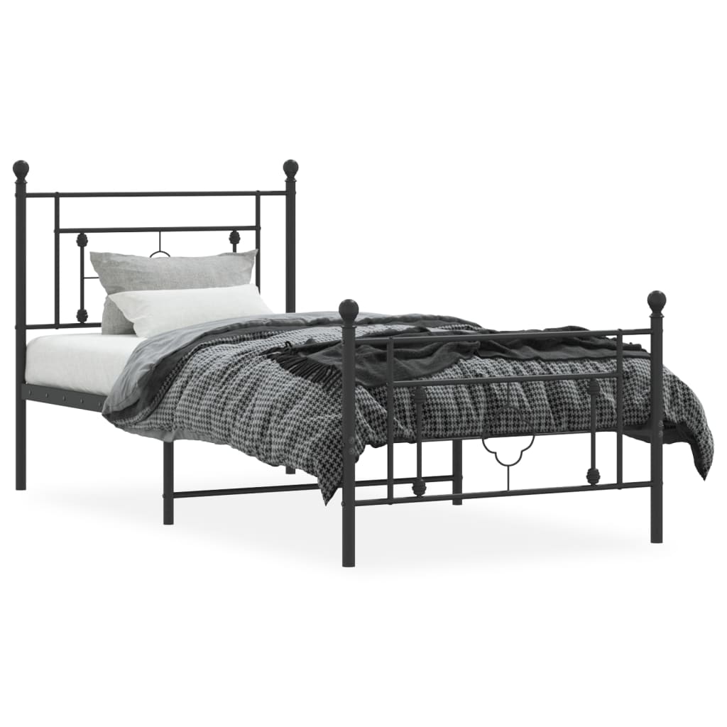 Black metal twin bed frame with decorative quatrefoil headboard detail