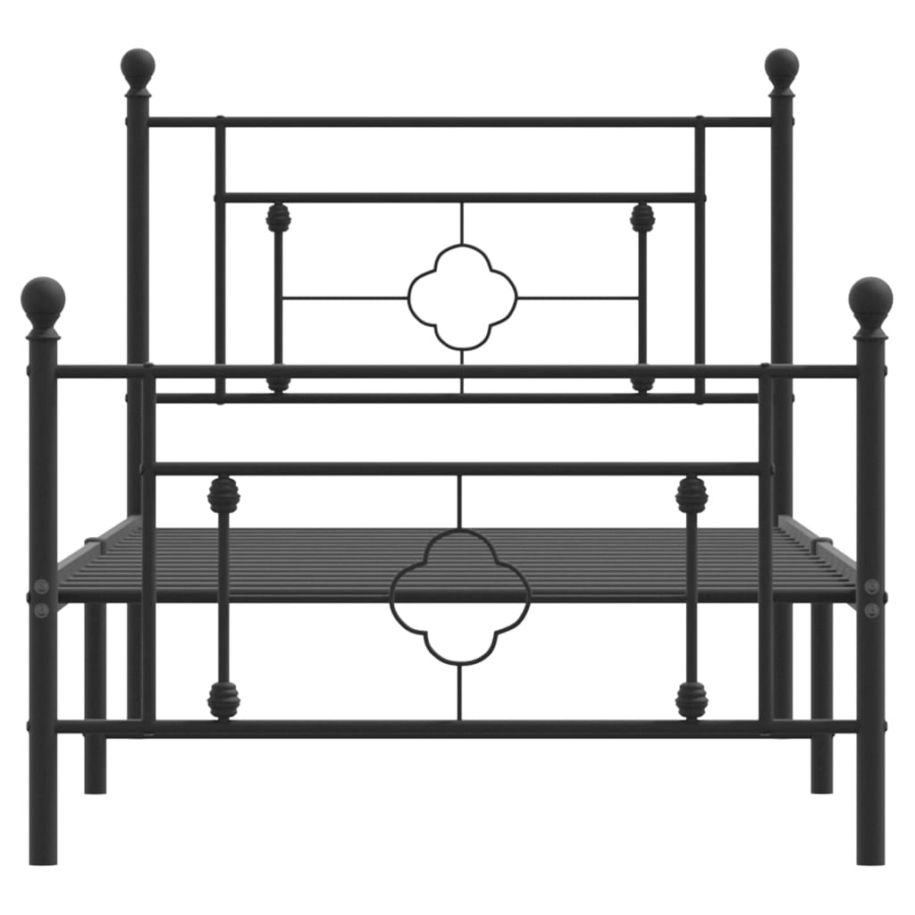 Black metal bed frame with decorative headboard and footboard