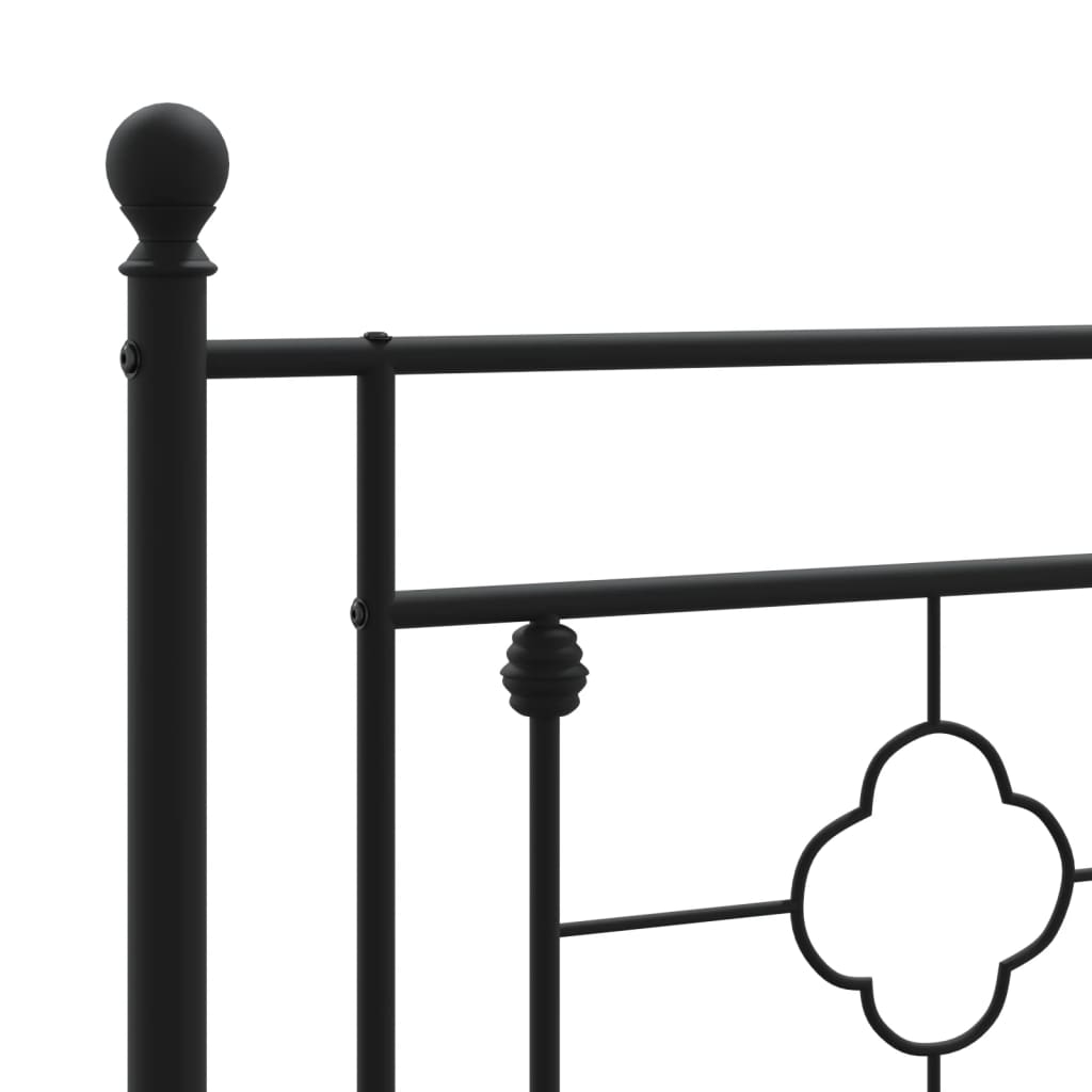 Black metal twin bed frame with ornate headboard detailing