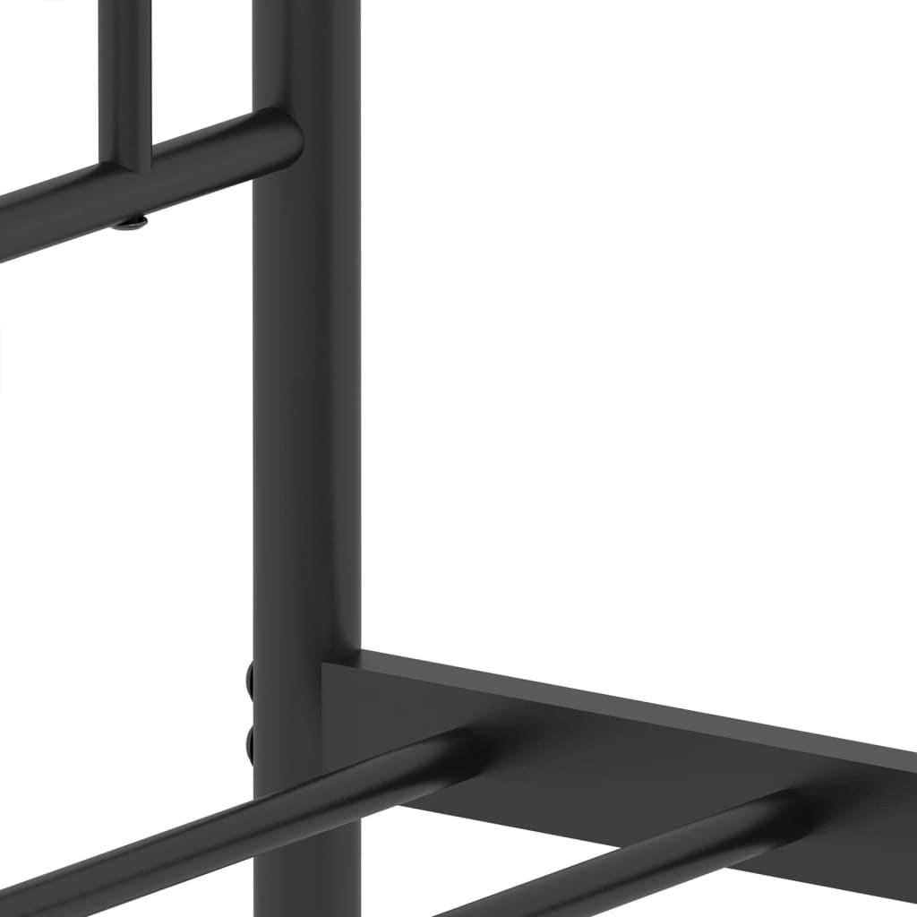 Black metal bed frame with decorative quatrefoil headboard detail