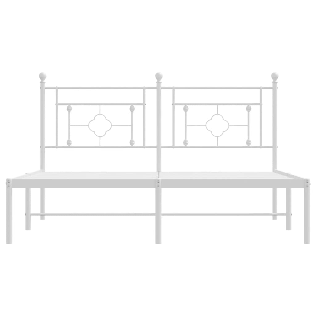 White metal bed frame with decorative headboard