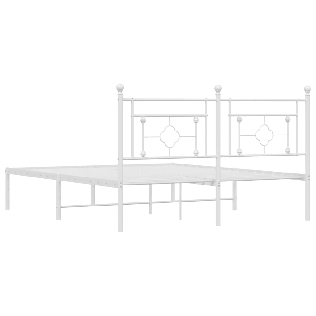 White metal daybed with decorative quatrefoil headboard