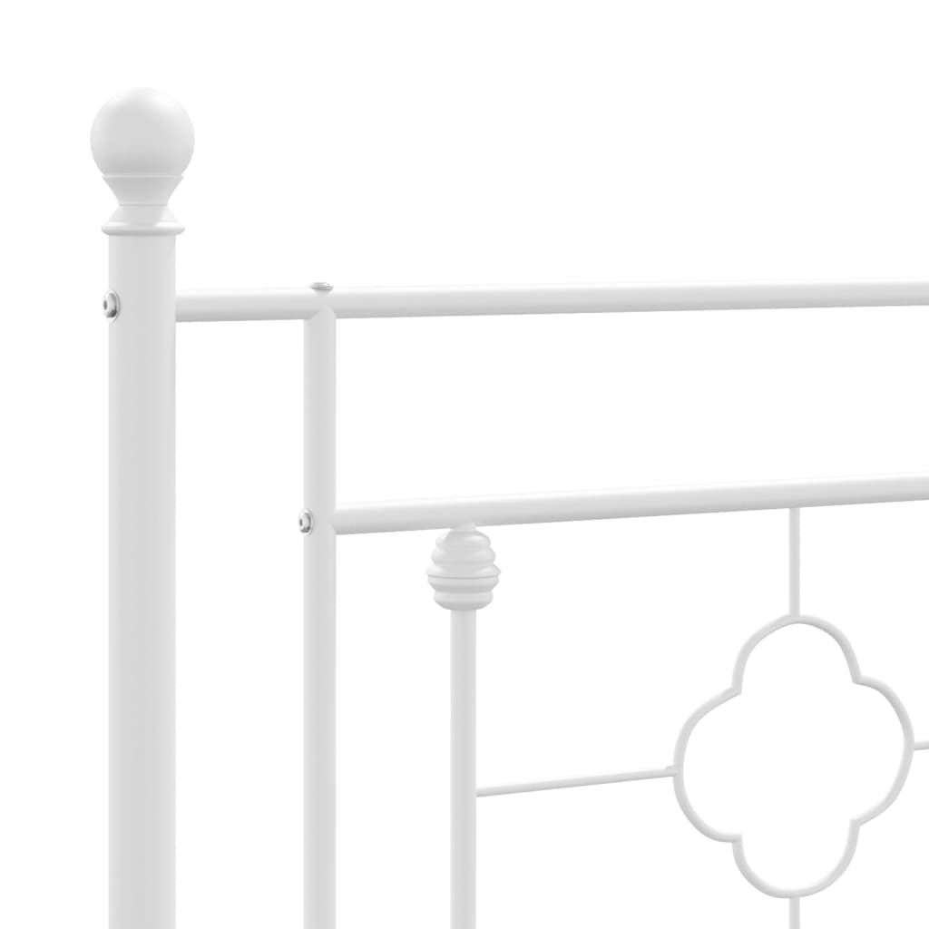 White metal bed frame with decorative headboard and slatted support