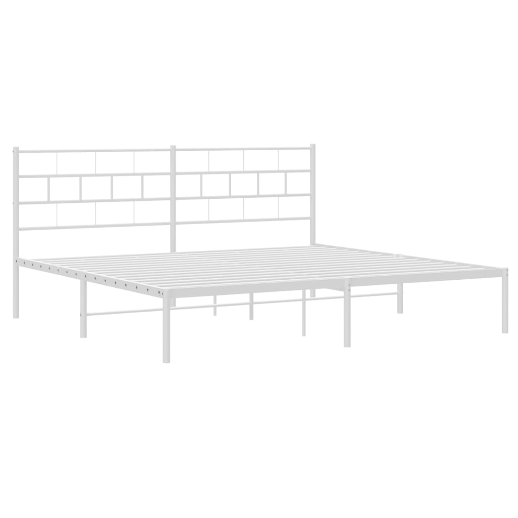 White metal bed frame with a slatted headboard and mattress