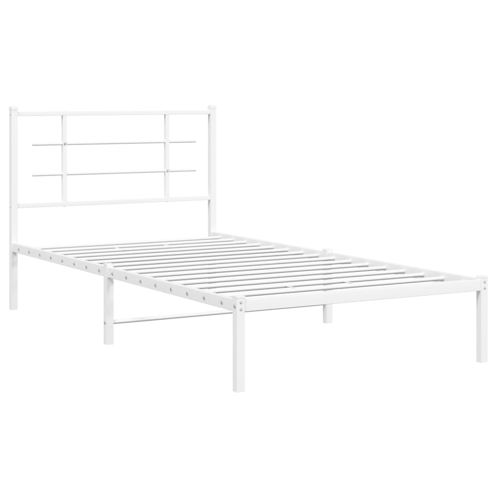 White metal twin bed frame with a modern headboard and grey bedding
