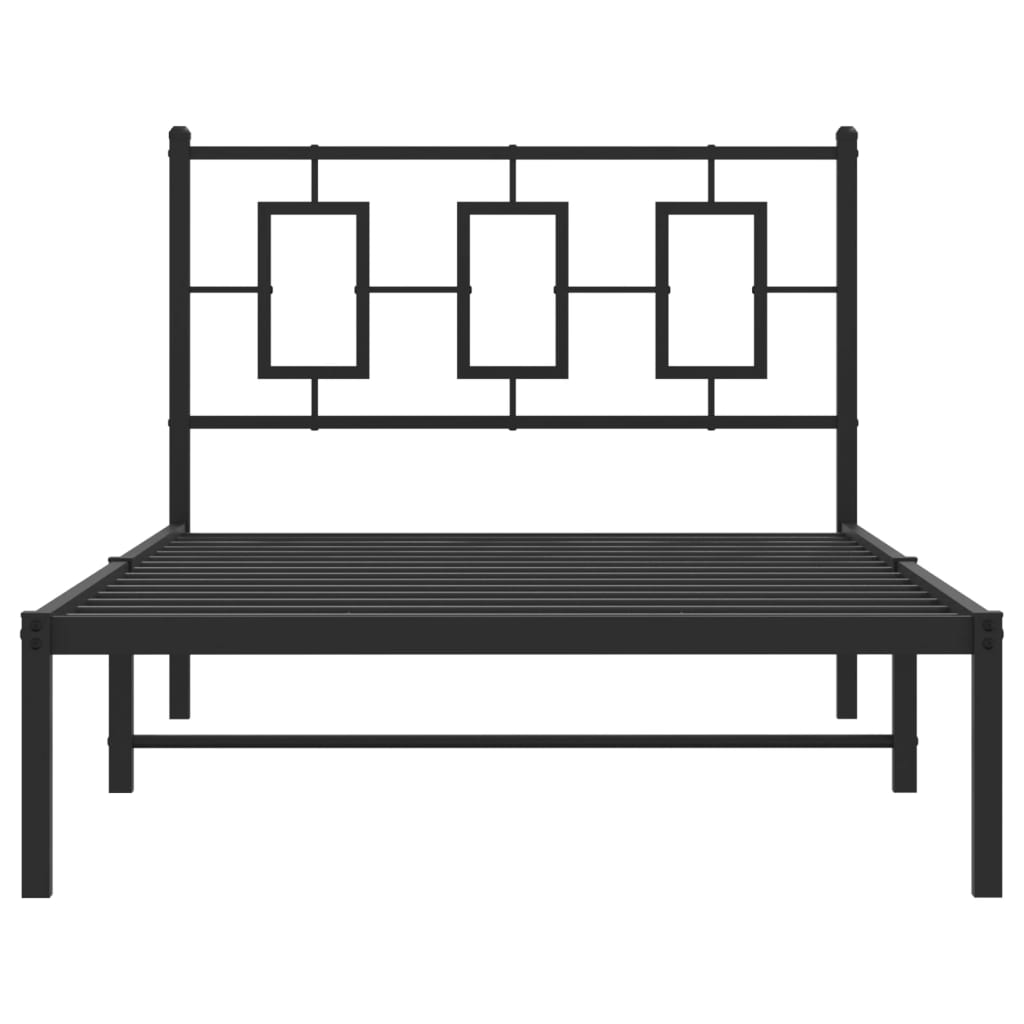 Black metal twin bed frame with geometric headboard and white mattress