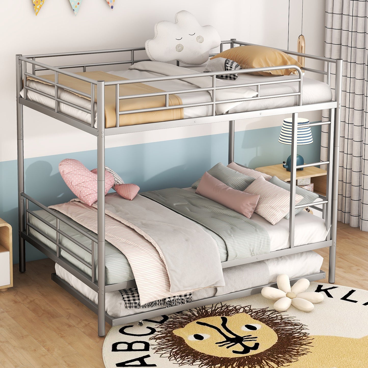 Silver metal twin over twin bunk bed with bedding and decorative pillows