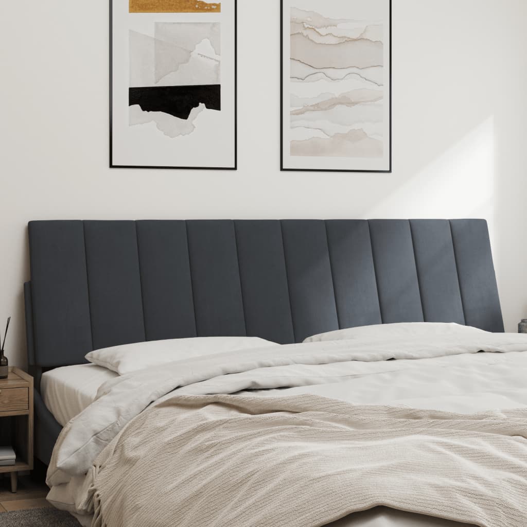 Upholstered grey headboard with vertical channel tufting