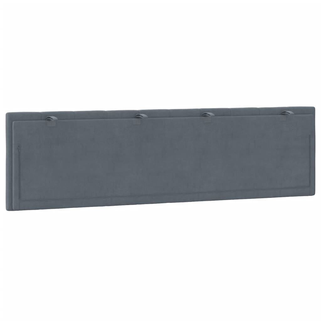 Deep grey upholstered headboard with vertical channel tufting and metal attachment hardware