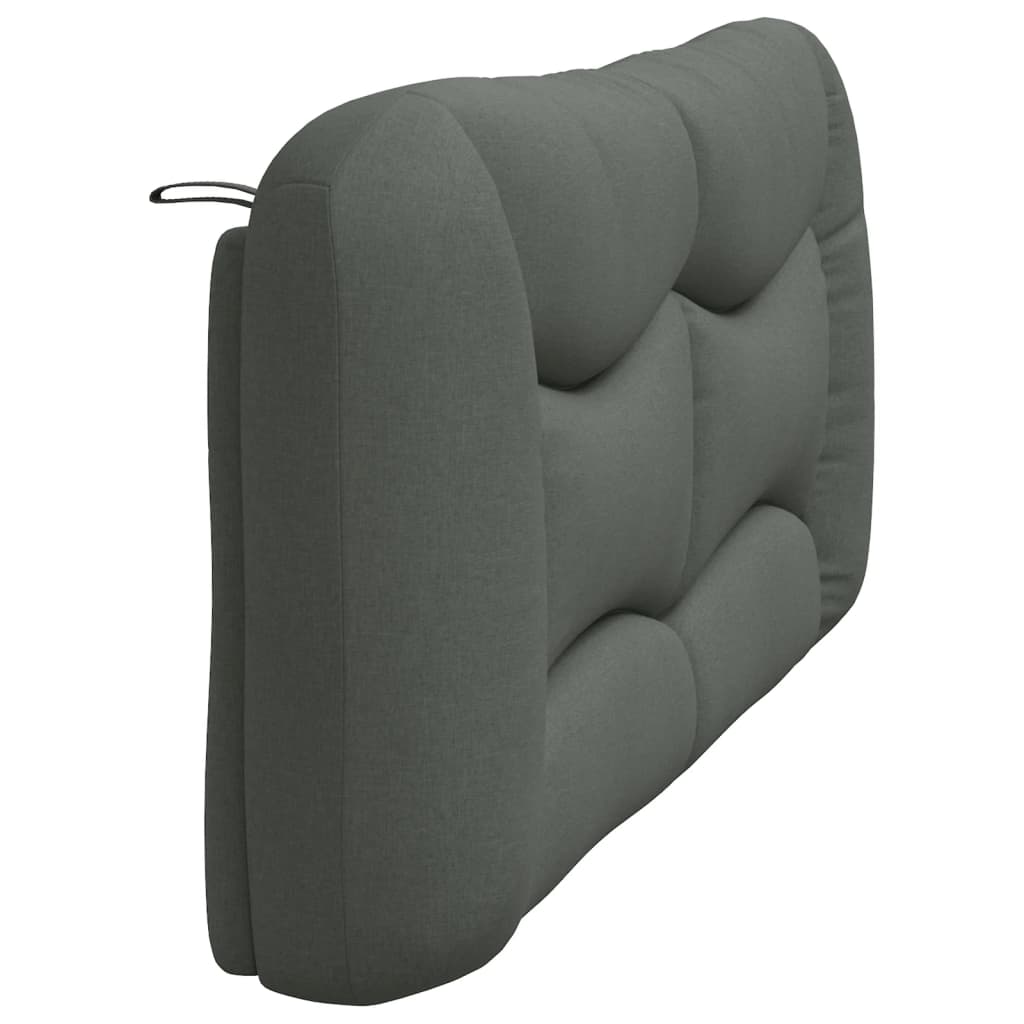 Gray fabric headboard with tufted detailing