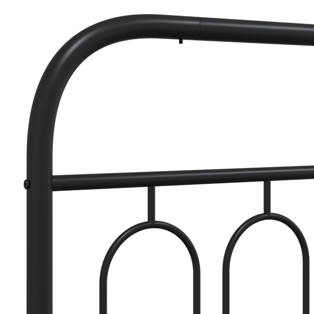 Black metal bed frame with rounded headboard and oval accents